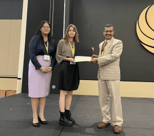 Arden Floyd receiving an award